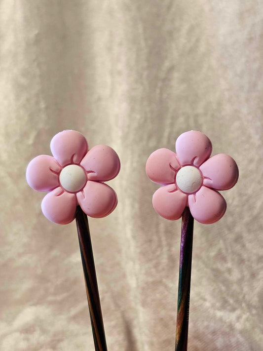 Lyse rosa blomster maskestoppere